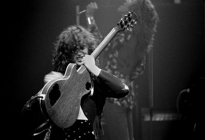 Led Zeppelin, Jimmy Page, Robert Plant, ‘Live at Olympia Stadium, Biting Strings’ © Michael Brennan at Proud Galleries, London