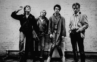 Sex Pistols, Sid Vicious, Johnny Rotten, Paul Cook, Steve Jones, ‘Oxford Street Glitterbest Photosession, No.I’ © Adrian Boot at Proud Galleries