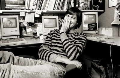 Steve Jobs, ‘Striped Sweater Laughing’ © Norman Seeff