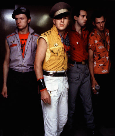 The Clash, Topper Headon, Joe Strummer, Mick Jones, Paul Simonon, ‘Backstage, Manchester Apollo, No.VI’ © Adrian Boot at Proud Galleries