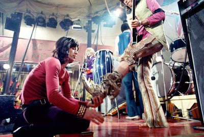 The Rolling Stones, Mick Jagger, Keith Richards, Brian Jones, ‘Keith Giving Mick the Boot’ © Bill Wyman at Proud Galleries