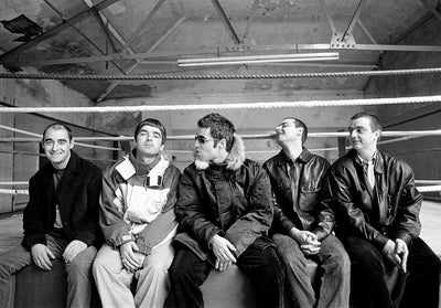 Oasis, Liam Gallagher, Noel Gallagher, Paul Arthurs, Paul McGuigan, Alan White, ‘At Boxing Club’ © Jill Furmanovsky at Proud Galleries London