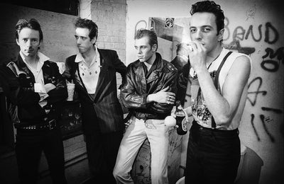 The Clash, Topper Headon, Joe Strummer, Mick Jones, Paul Simonon, ‘Posing’  © Michael Grecco at Proud Galleries, London