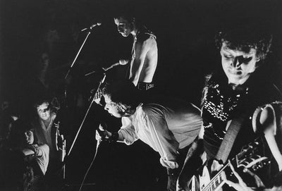 The Sex Pistols, Sid Vicious, Johnny Rotten, ‘Live on Stage’ © Adrian Boot at Proud Galleries